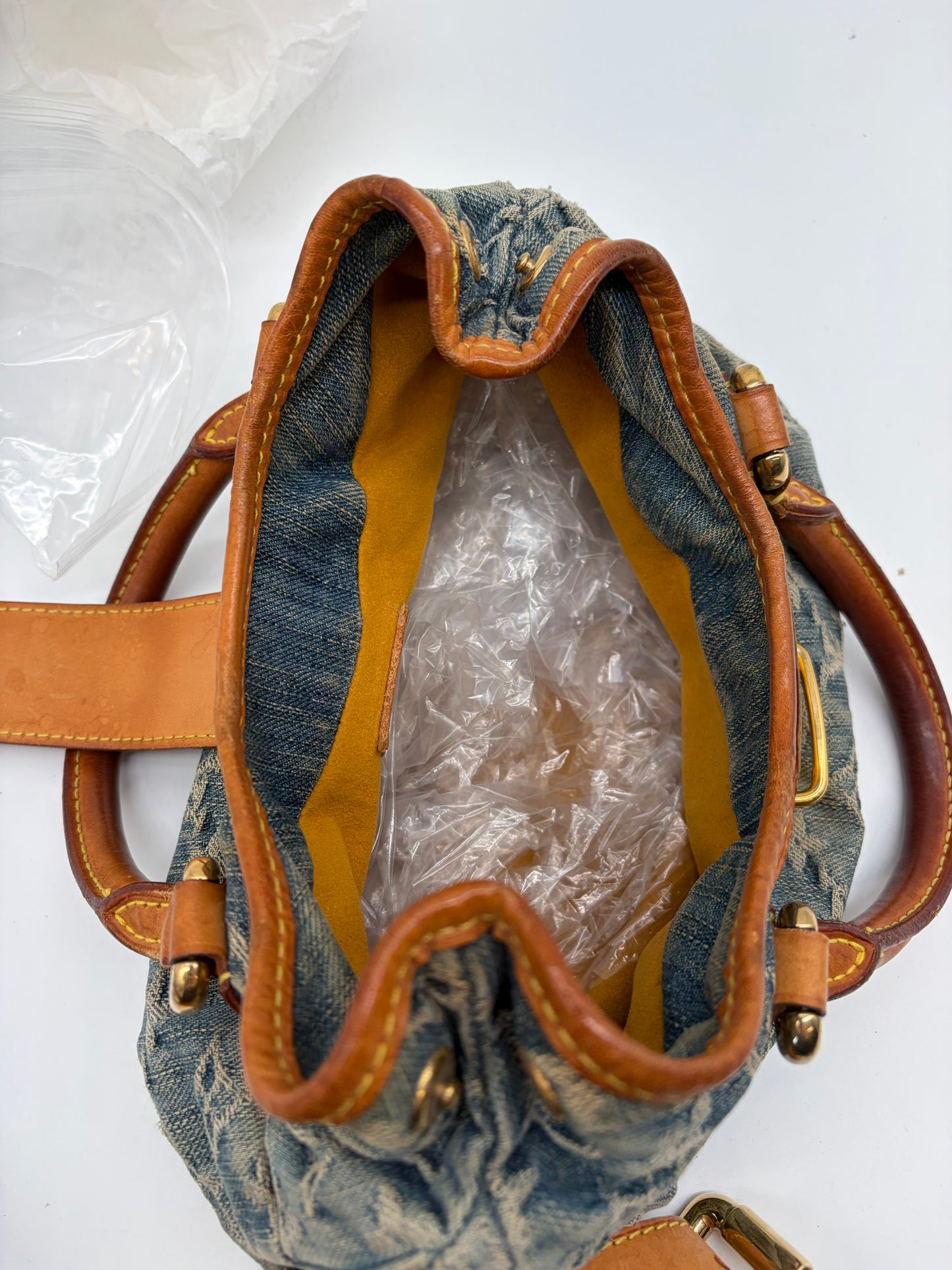 Louis Vuitton Pleaty Monogram Denim Handtasche