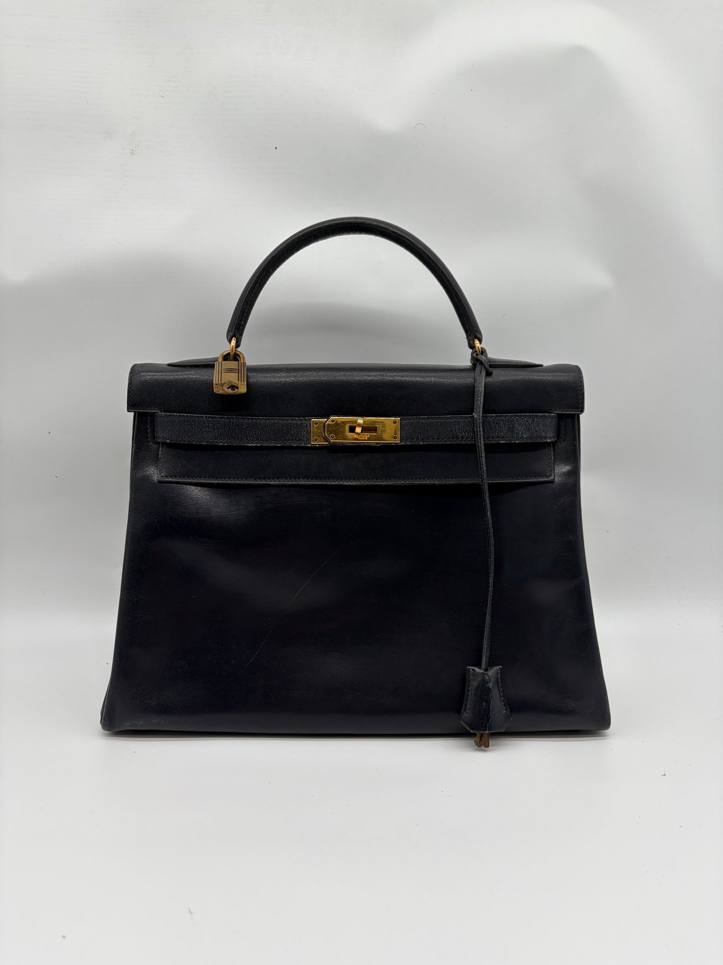 Hermès Kelly 32 Handtasche Navy Kalbsleder