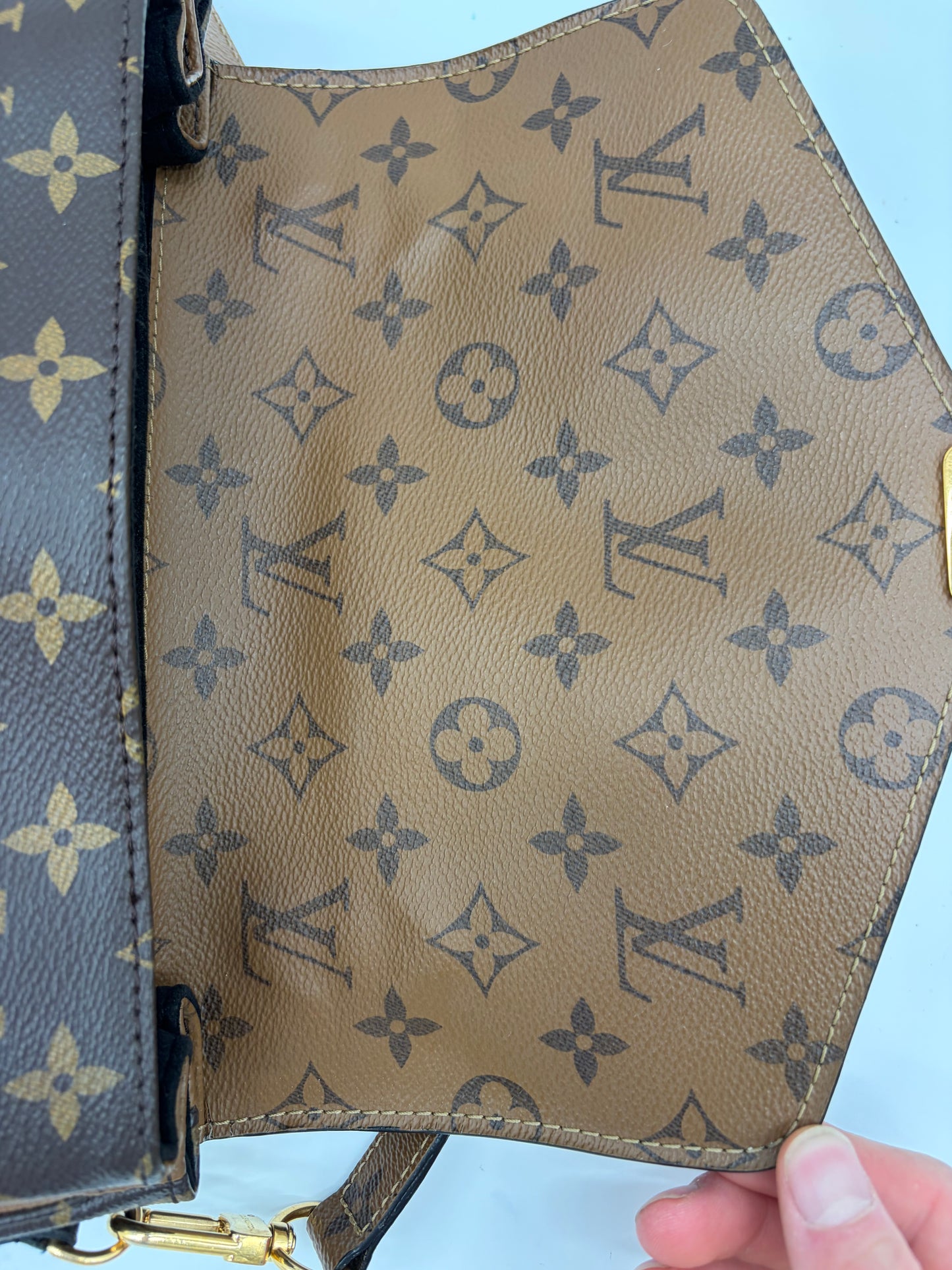 Louis Vuitton Pochette Métis Reverse Monogramm Handtasche